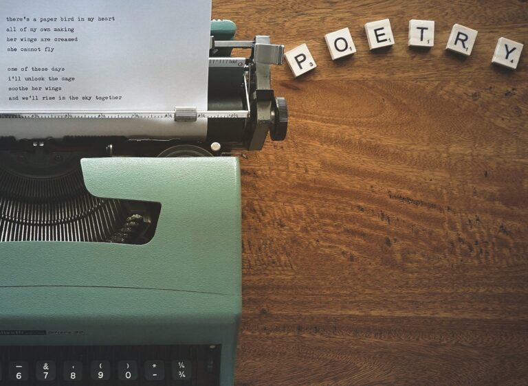 scrabble tiles near a typewriter